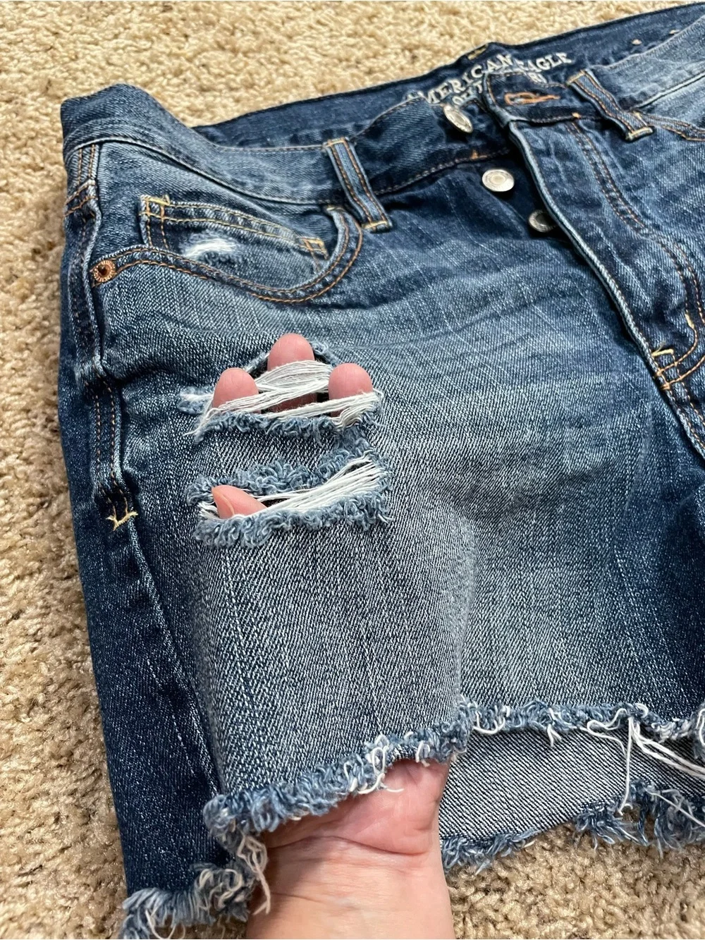 Women’s American Eagle blue jean denim destructed cutoff shorts size 10/12 -READ